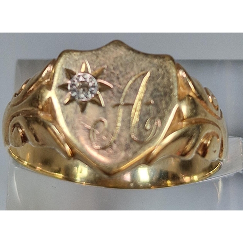 220 - 9ct gold shield shaped signet ring with tiny diamond chip, 3.9g approx. Ring size W (B.P. 21% + VAT)