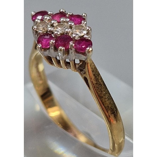 223 - 9ct gold diamond and red stone lozenge shaped ring, 3.3g approx. Ring size Q 1/2 (B.P. 21% + VAT)