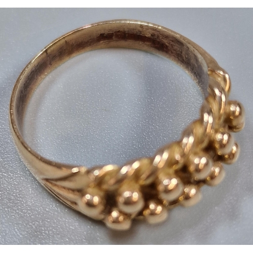 224 - 9ct gold 'keeper' ring, 6g approx. Ring size T (B.P. 21% + VAT)