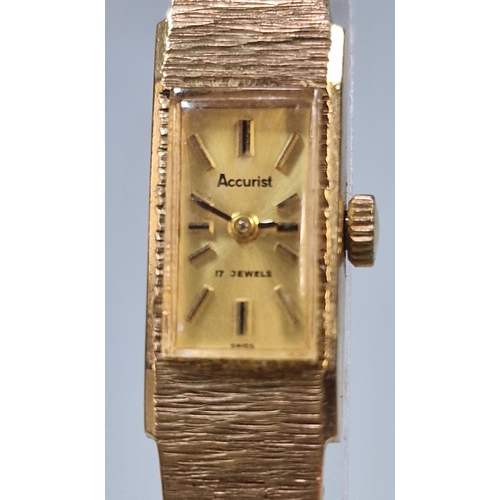 241 - Accurist 9 carat gold wristwatch having small rectangular head with baton numerals and integral bark... 