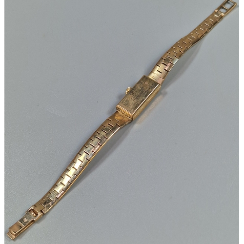 241 - Accurist 9 carat gold wristwatch having small rectangular head with baton numerals and integral bark... 