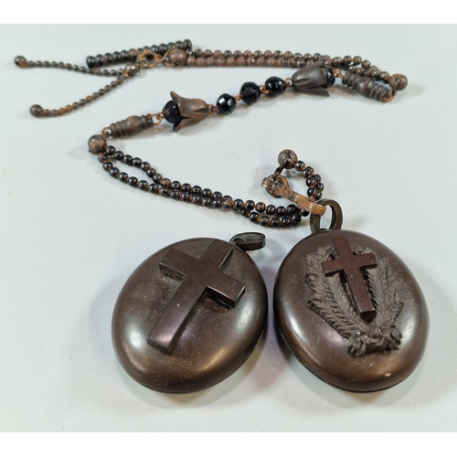 258 - Two Victorian mourning lockets, together with T-Bar metal and Whitby jet chain (B.P. 21% + VAT)