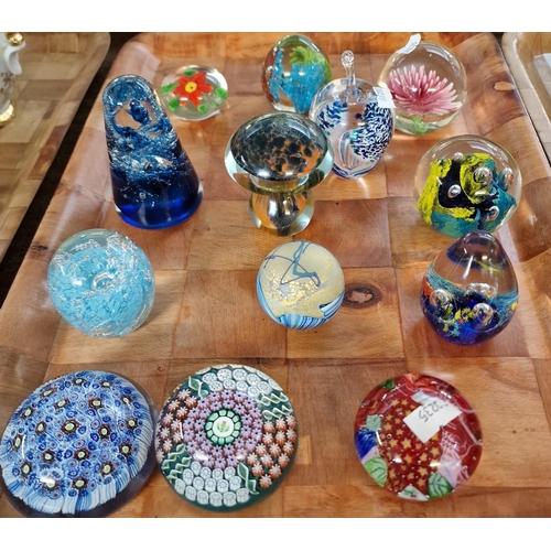 305 - Collection of glass paperweights, varying designs including: Laugharne, mushrooms, fruit designs, Ca... 