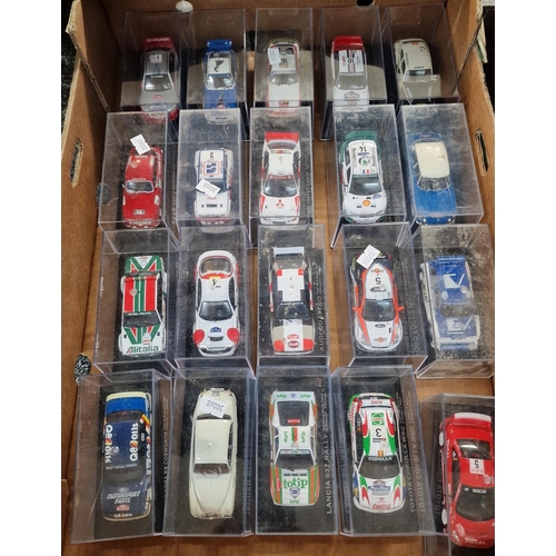 324 - Three trays of diecast model vehicles of Rally or Touring cars in perspex cases. Approximately 55.  ... 