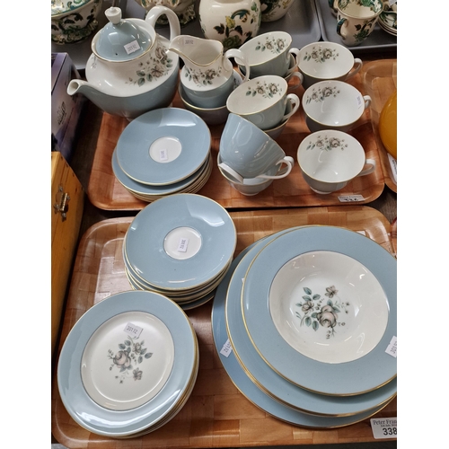 338 - Two trays of Royal Doulton 'Rose Elegans' teaware: cups, saucers, teapot, milk jug, sucrier, bowls a... 