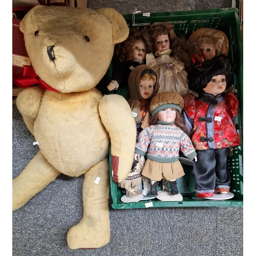 342 - Large mid century teddy bear with stitched nose and moveable limbs together with some modern dolls. ... 