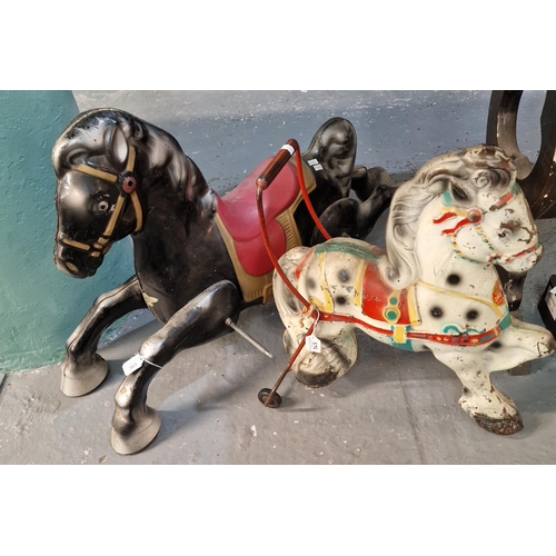 363 - Vintage Mobo child's tin plate push along toy horse together with a vintage tin plate rocking horse.... 