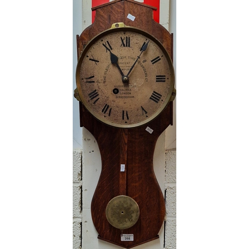 398 - A Gledhill-Brook Time Recorders Ltd patent Empire clock mounted on oak back with exposed pendulum. F... 