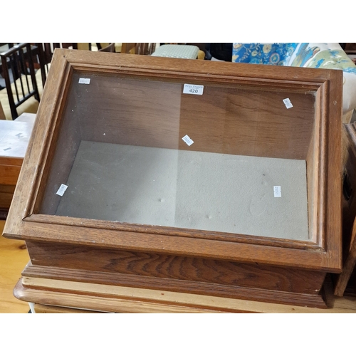 420 - Small oak glazed fall front tabletop display cabinet (B.P. 21% + VAT)