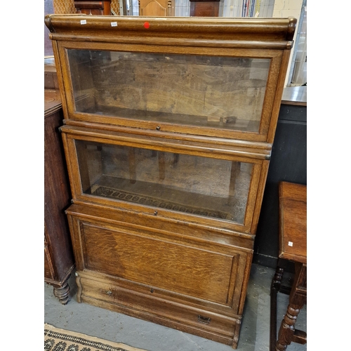 431 - Early 20th century oak Wernicke type three sectional, glazed bookcase. (B.P. 21% + VAT)