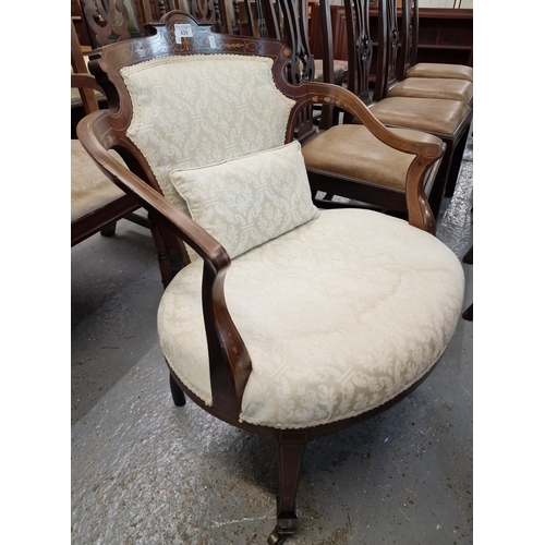 439 - Edwardian mahogany inlaid bedroom armchair on square tapering front supports, brass cups and castors... 