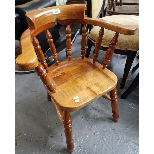 446 - Reproduction child's smokers bow type spindle chair (B.P. 21% + VAT)