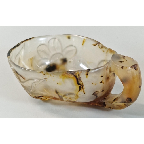 45 - Chinese agate-like stone libation cup carved as a flowering branch, the stem forming the handle.  12... 