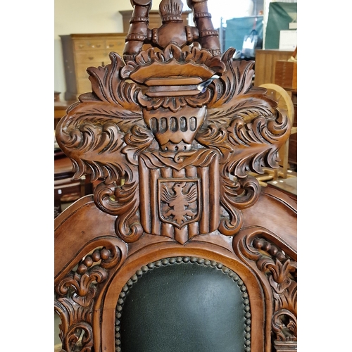 451 - A modern reproduction carved hardwood 'throne' type chair, carved and pierced back with carved crest... 