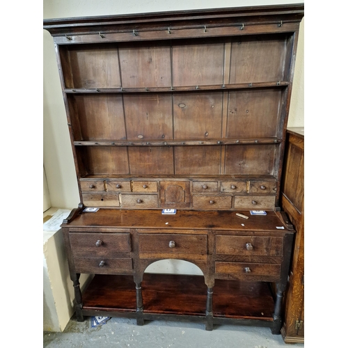 455 - 19th century oak and mixed woods two-stage dresser, the moulded cornice above boarded rack with an a... 