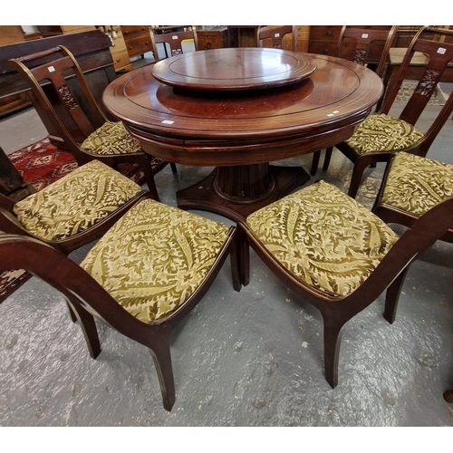 462 - Chinese hardwood drum  dining table with stepped 'Lazy Susan' type revolving upper surfaces on a flu... 