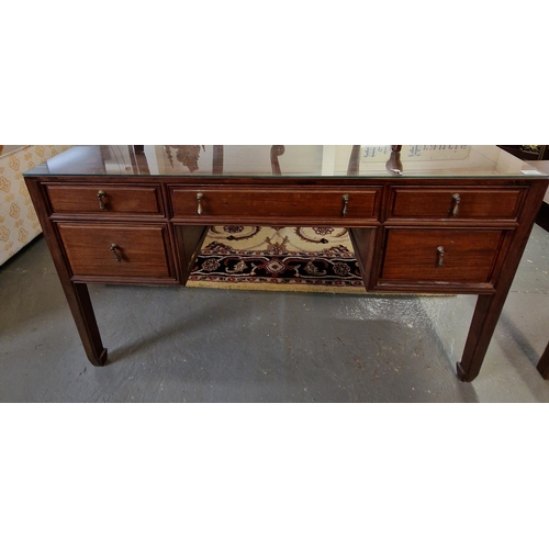 475 - Chinese hardwood writing desk with plate glass top over panel moulded upper surface, an arrangement ... 