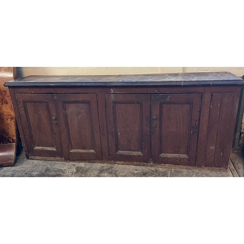 487 - Late 19th / early 20th century pine four door dresser base or sideboard, the interior revealing fitt... 