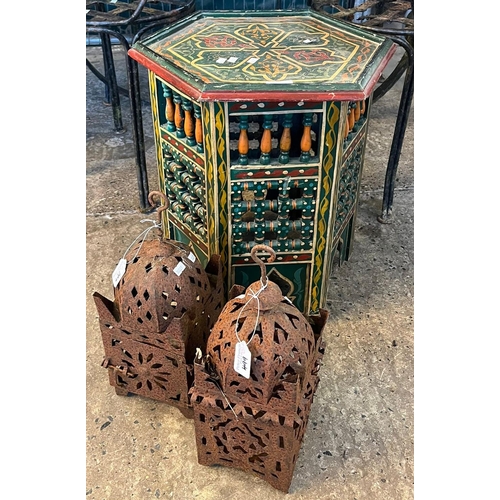 499 - A Moroccan Moorish hexagonal painted side tale together with a pair of metal Moorish hanging lantern... 