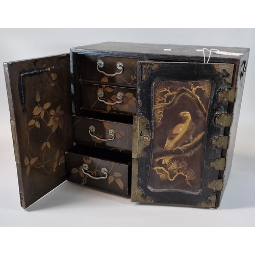 51 - Japanese Export gilt lacquered jewellery cabinet with engraved metal fittings, the interior revealin... 