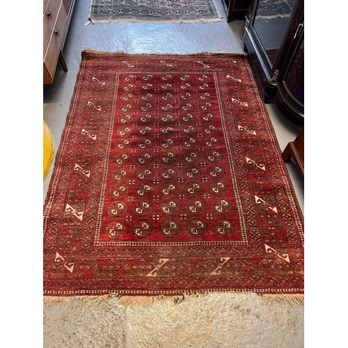 523 - A  vintage Heriz rug with central medallion together with an Afghan Ersari Hatchli style rug or carp... 