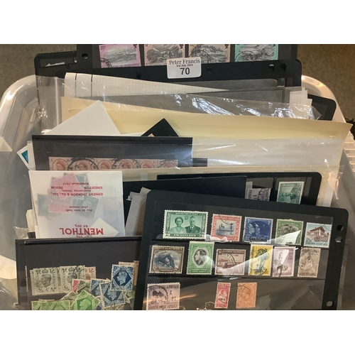 70 - Plastic box of all World stamps in packets, envelopes, on pages and cards. Many 100's of stamps (B.P... 