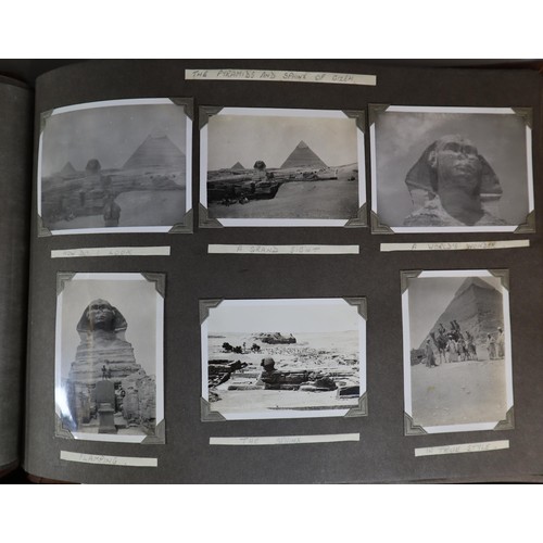 133 - Two leather bound photo albums from 1940's with assortment of military interest photos from Middle E... 