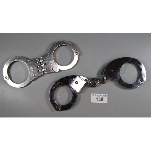 146 - One pair of hinged Hiatts handcuffs, issued to dog handlers etc. One pair of Hiatts 1960 pattern han... 