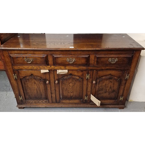 453 - Two 18th century style oak furniture items, a dresser base and similar drinks cabinet, probably by T... 