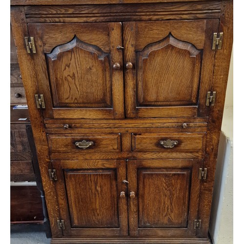 453 - Two 18th century style oak furniture items, a dresser base and similar drinks cabinet, probably by T... 