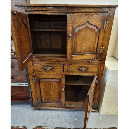 453 - Two 18th century style oak furniture items, a dresser base and similar drinks cabinet, probably by T... 