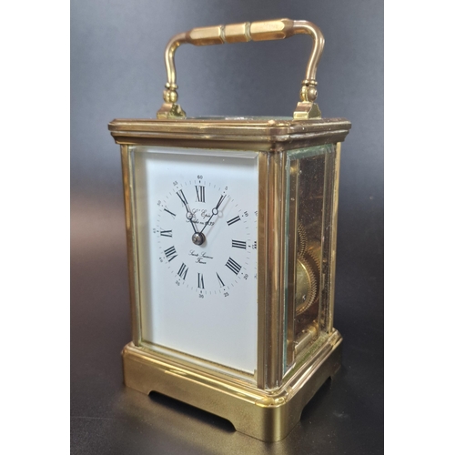 10 - French brass carriage clock with full depth Roman white face, marked 'Lamb, Lucerne, France'.  Compl... 