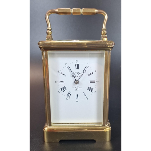 10 - French brass carriage clock with full depth Roman white face, marked 'Lamb, Lucerne, France'.  Compl... 