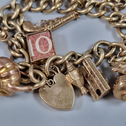 102 - 9ct gold curb-link charm bracelet to include: Queen Elizabeth II gold full sovereign dated 1964, hea... 