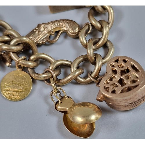 102 - 9ct gold curb-link charm bracelet to include: Queen Elizabeth II gold full sovereign dated 1964, hea... 