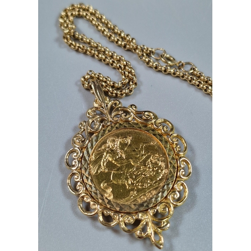 106 - Queen Elizabeth II gold full Sovereign dated 1982 in ornate 9ct gold mount on a 9ct gold chain. The ... 