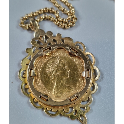 106 - Queen Elizabeth II gold full Sovereign dated 1982 in ornate 9ct gold mount on a 9ct gold chain. The ... 