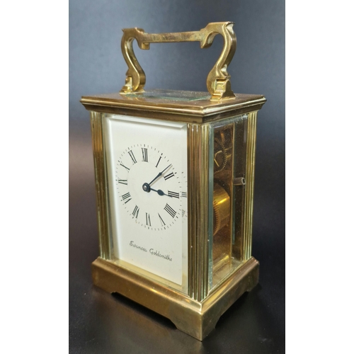 11 - French brass carriage clock, having fluted gorge case and full depth Roman face marked 'Swansea Gold... 