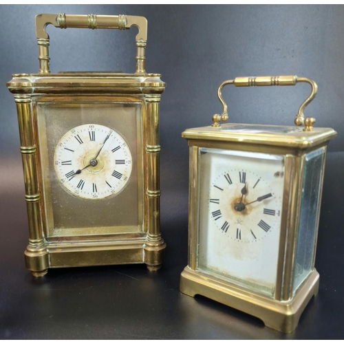 12 - Two French brass carriage clocks to include large version with circular Roman face and projecting pi... 