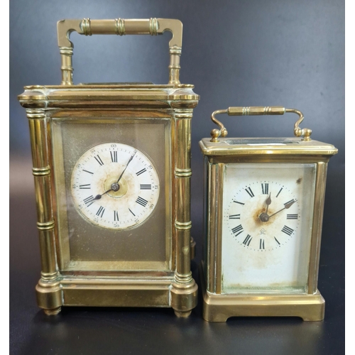 12 - Two French brass carriage clocks to include large version with circular Roman face and projecting pi... 