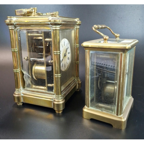 12 - Two French brass carriage clocks to include large version with circular Roman face and projecting pi... 