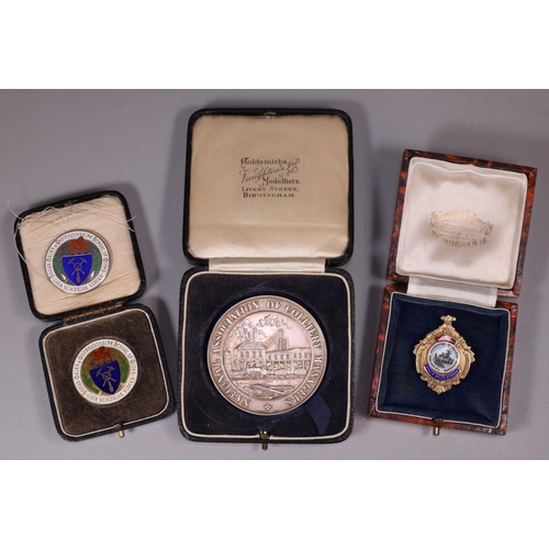 126 - Group of Welsh Mining medals and medallions awarded to Daniel Jones, together with a group of assort... 