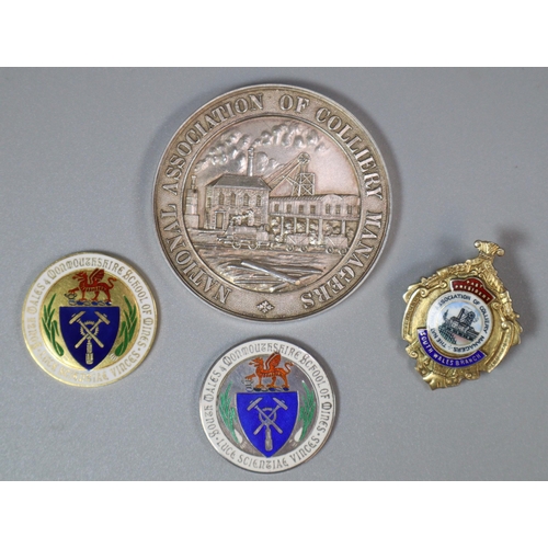 126 - Group of Welsh Mining medals and medallions awarded to Daniel Jones, together with a group of assort... 