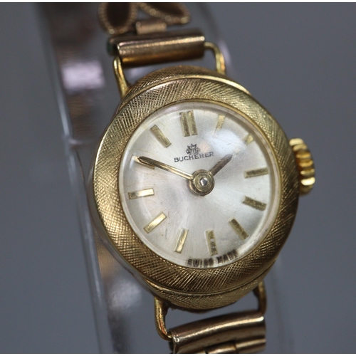 129 - Bucherer 18ct gold small head ladies' cocktail watch, having satin face with Baton numerals and on l... 