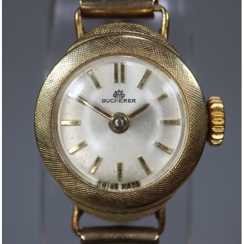 129 - Bucherer 18ct gold small head ladies' cocktail watch, having satin face with Baton numerals and on l... 