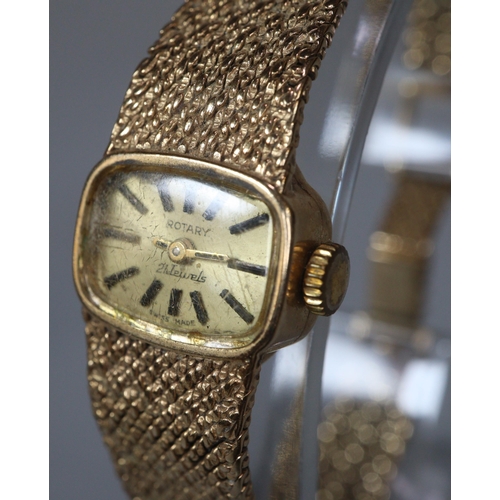 131 - Rotary 9ct gold ladies' oval faced bracelet cocktail watch, having satin face with Baton numerals on... 