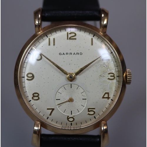 133 - Garrard 9ct gold vintage design gentleman's wristwatch with satin face having Arabic numerals and se... 