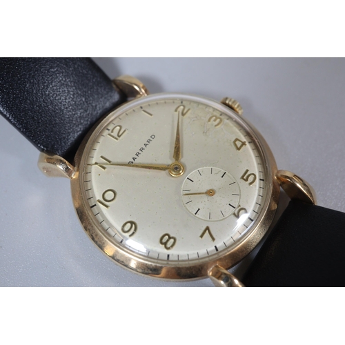 133 - Garrard 9ct gold vintage design gentleman's wristwatch with satin face having Arabic numerals and se... 