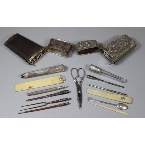 149 - Two early 19th century white metal and shagreen etui sets, both with assorted implements to the inte... 