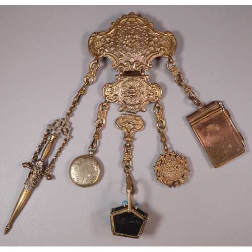 150 - 19th century ladies' brass chatelaine with five appendages to include: thimble holder with thimble, ... 